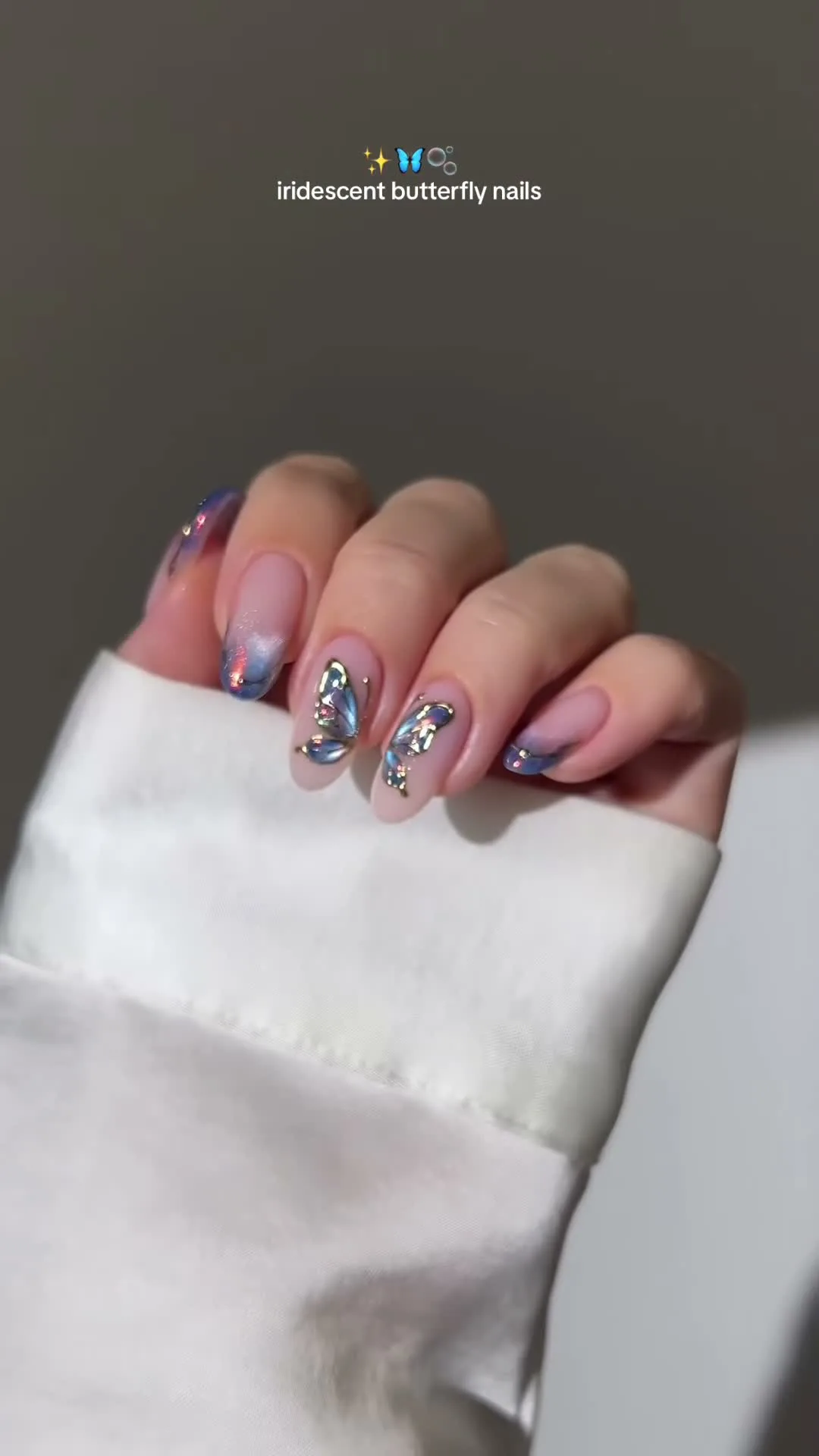 Iridescent Flutter butterfly nail design