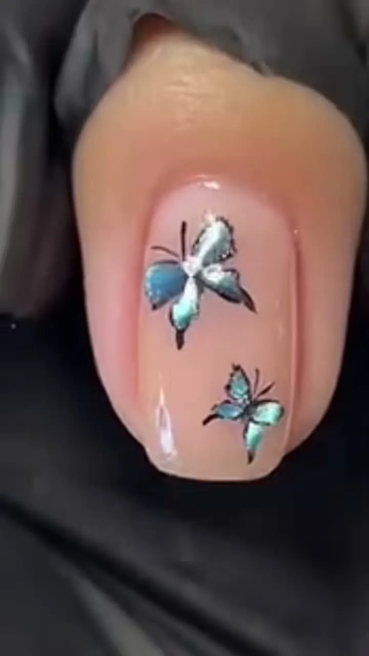 Teal Jewel Butterflies butterfly nail design