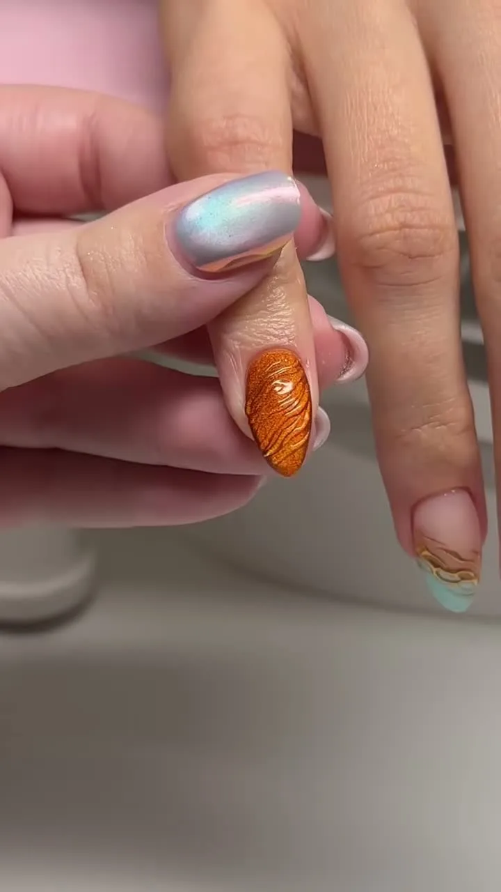 Pearl and Tangerine butterfly nail design