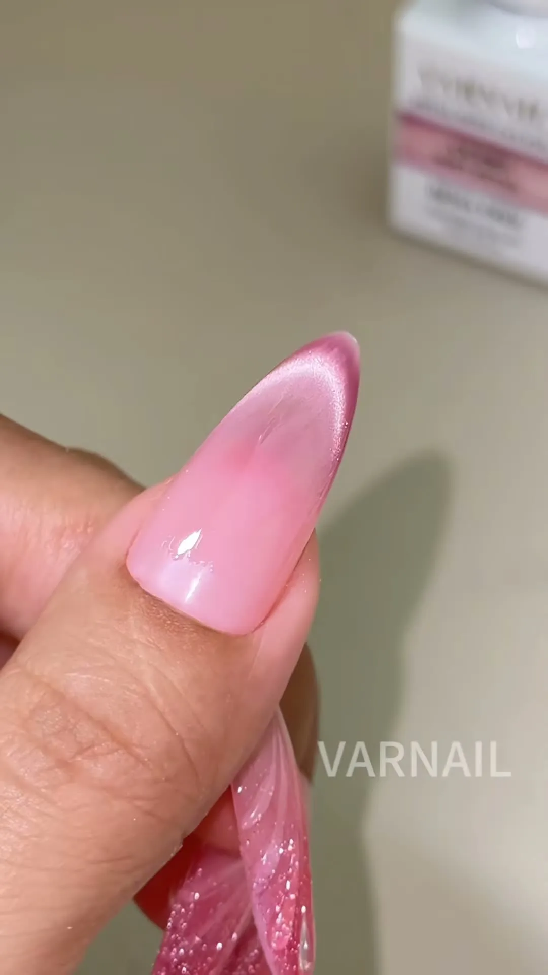 Rose Quartz cat-eye nail design