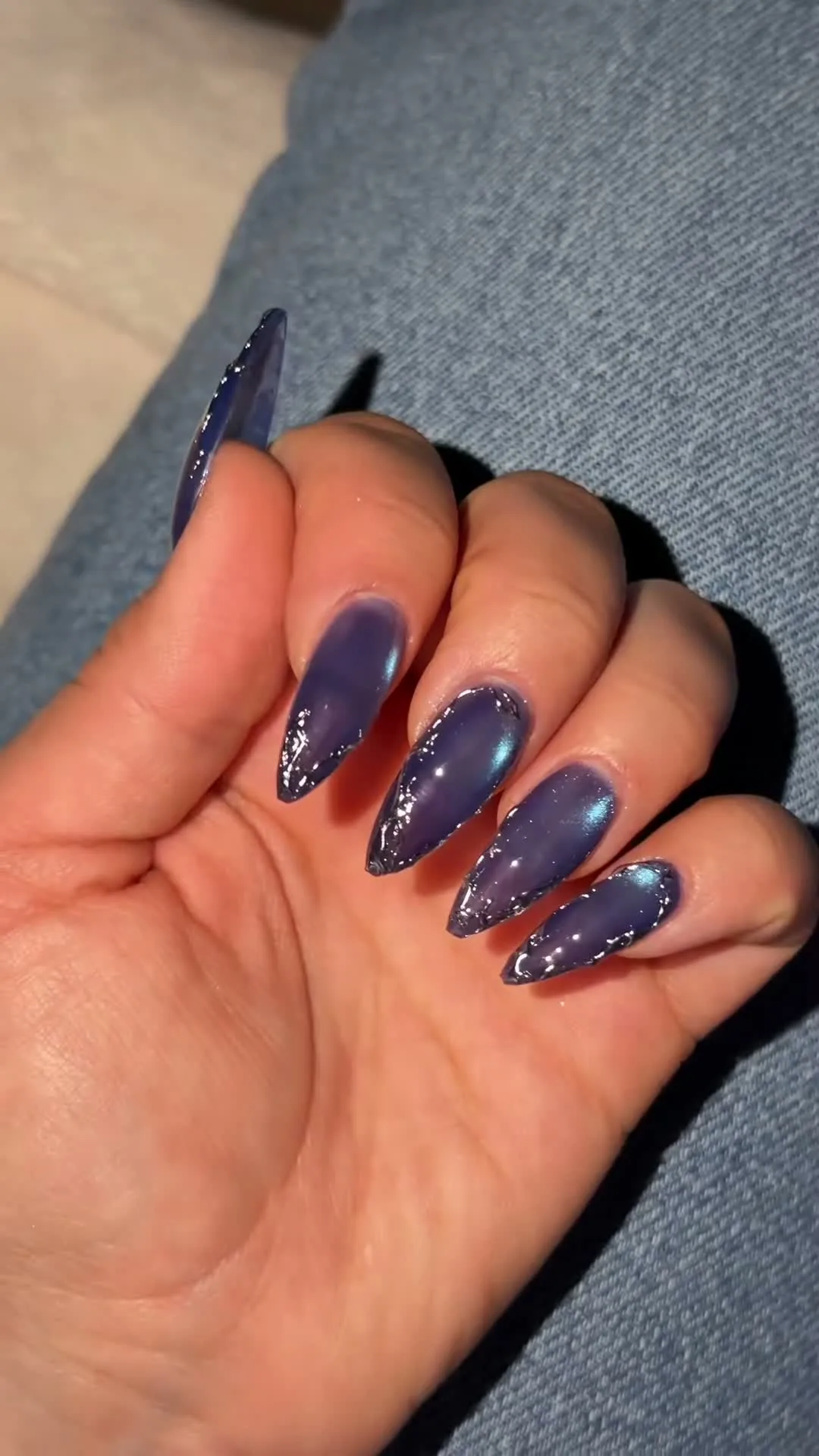 Midnight Amethyst cat-eye nail design