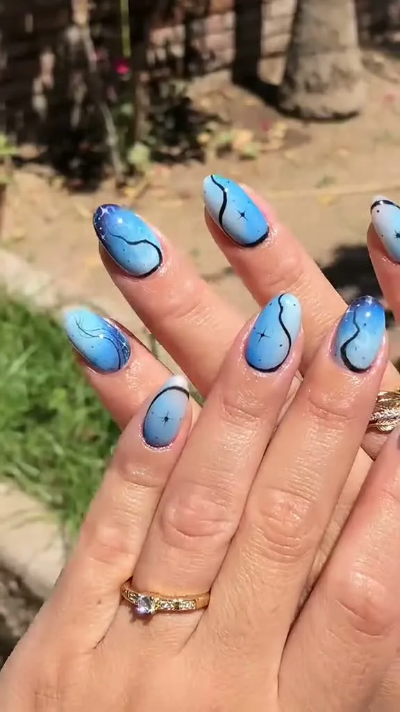 Blue Agate cat-eye nail design